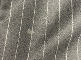 a close up of a piece of fabric with pinstripes