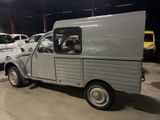 an image of a small truck parked in a garage