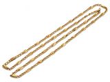 a close up of a gold chain bracelet on a white background