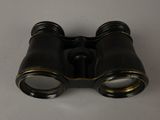 a pair of binoculars that are sitting on a table