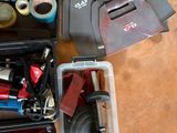 many different tools in a plastic case on the table