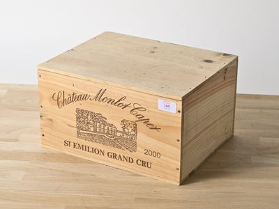 a wooden box that has a wine label on it