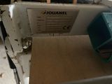 a sewing machine that is sitting on a table