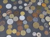 a lot of coins that are on the table