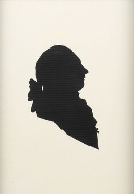 silhouette of a man with a pipe in his hand