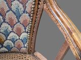 the back of a chair with a blue and brown upholstered upholstered upholstered uphol