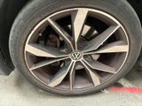 a close up of a tire on a car ' s rim