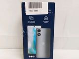 the back of a box with a phone in it on a white surface