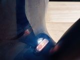 a close up of a person ' s shoe with a toothbrush in it