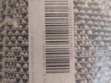a close up of a bag of food with a barcode on it