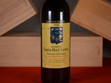 a bottle of wine that is sitting on a table