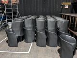 a lot of chairs that are sitting in the middle of a room