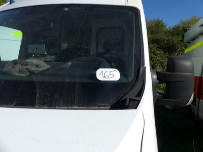 a white van that has a sticker on the side of it
