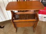 a small table with a basket on top of it
