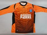 an orange and black soccer jersey with the words madison ' s pierre on it