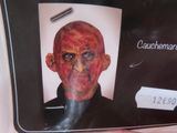 a picture of a picture of a man with blood on his face