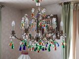 a chandelier that is hanging from the ceiling in a room