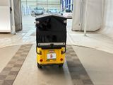 a small cart that is sitting in the middle of a room