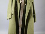 an image of a coat hanging on a clothes rack in a room