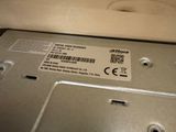 a close up of a laptop with a barcode on it