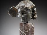 an image of a sculpture of a woman ' s head on top of a marble block