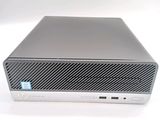 the hp desktop computer is on a white surface with a blue sticker on it