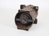 a small metal object that is sitting on a white surface
