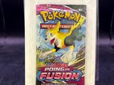 a close up of a pokemon trading card in a package