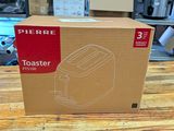 a box that has a toaster in it on a table