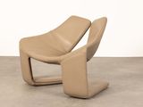 an image of a chair that is sitting on a concrete floor