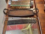 three glass trays sitting on a table in a room