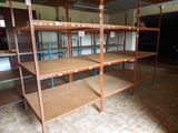 a room with a lot of shelvings in it