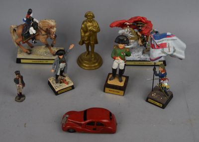 many figurines of different types and sizes on display
