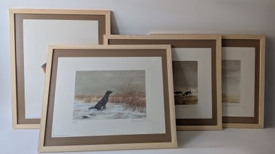 three framed pictures of a bird and a dog in a snowy field