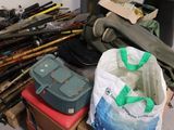a pile of assorted items on the floor in a room