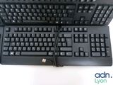 a keyboard and a mouse sitting on top of each other
