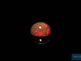 an oplite is shown in the dark with a black background