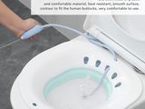a person using a toothbrush to clean a toilet