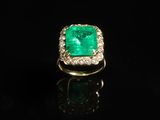 an emerald and diamond ring