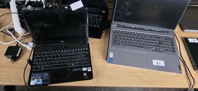 many laptops that are sitting on a table