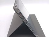 a tablet that is sitting on top of a stand