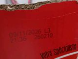 a close up of a box of coca cola on a table