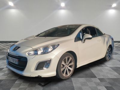 a picture of a white car on a checkered floor