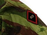an image of a close up of a jacket with a patch on it