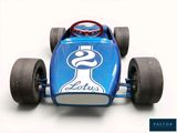 a blue race car with a number on the front