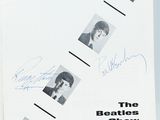 an open book with a bunch of photos of the beatles on it