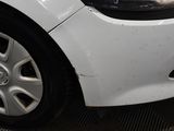 a close up of a car ' s headlight and front bumper