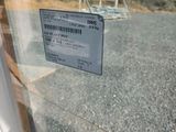 a sign on the window of a building that says it is closed