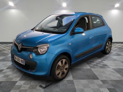 a picture of a blue car parked in a garage