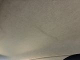 the back seat of a car with the sun shining through the window